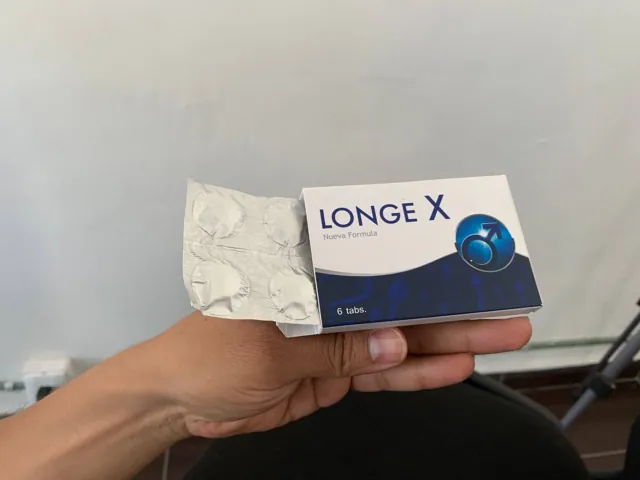 Caja de Longe X abierta con el blíster de 6 tabletas